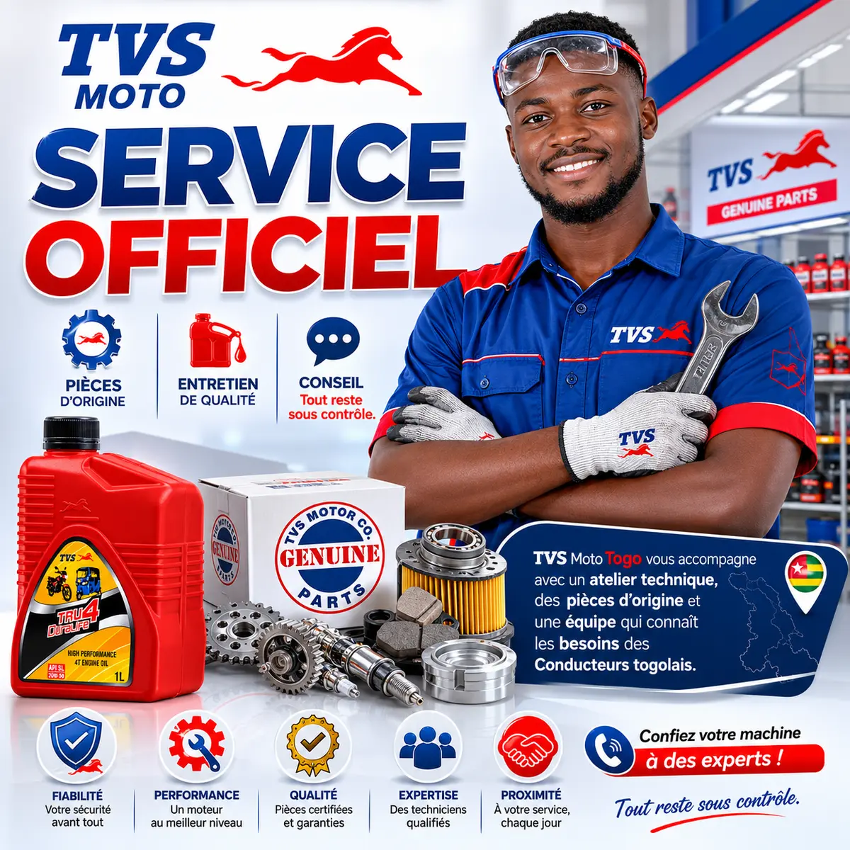 Mécanicien travaillant sur une moto TVS